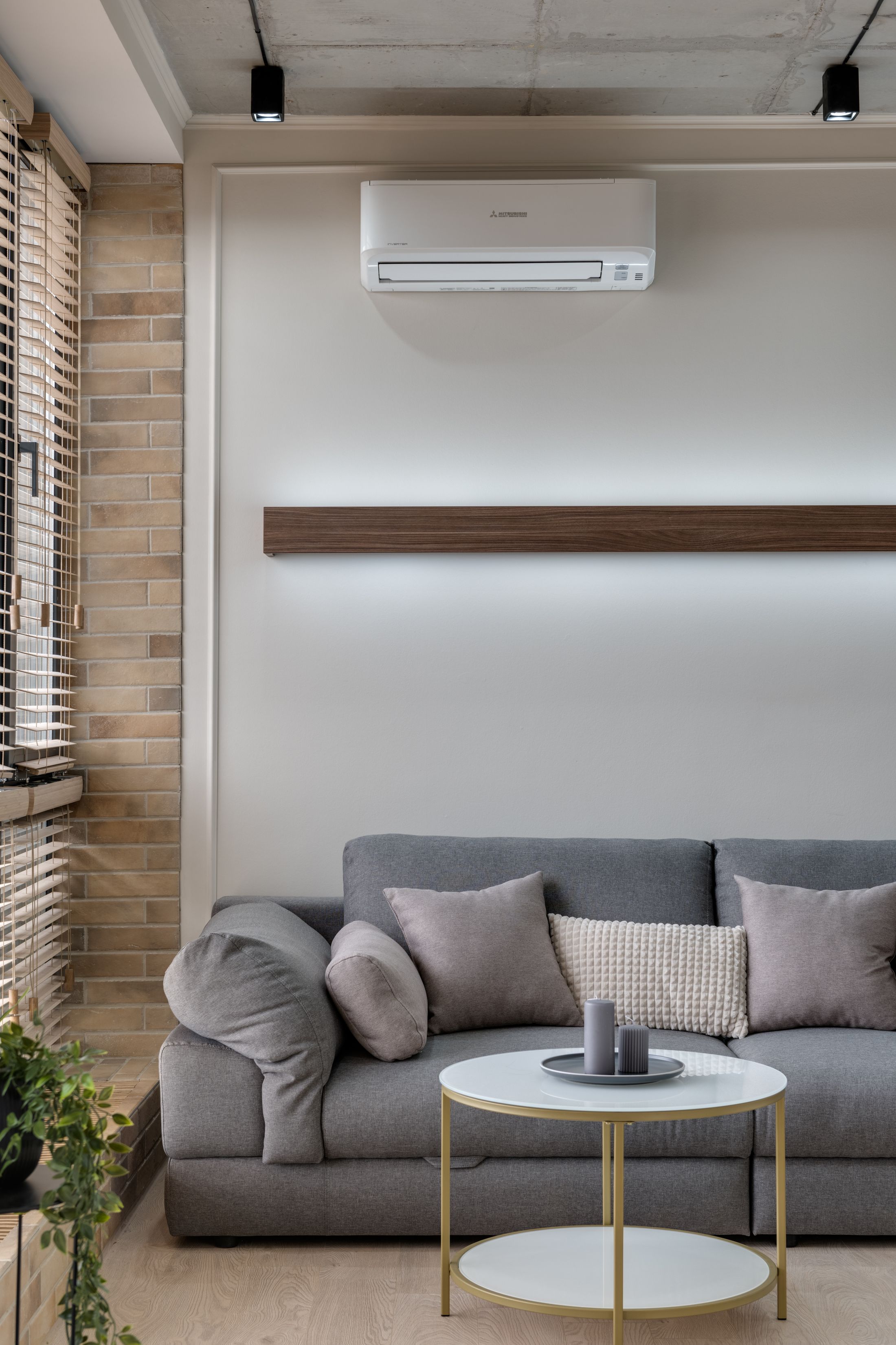 Modern sofa area with wall mounted air conditioning